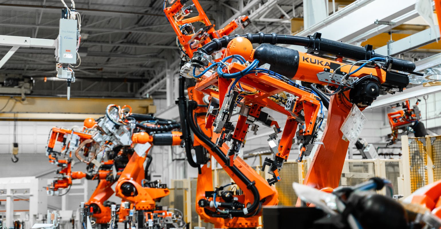 The project for HGA and KUKA involved a turnkey automation system for a five-zone automation system that incorporated part handling, stud spot welding, and adhesive dispensing for a BEV rear-quarter assembly.