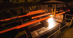 Steel billets at torch cutting of a six-strand continuous casting machine. Steel billets at torch cutting of a six-strand continuous casting machine.