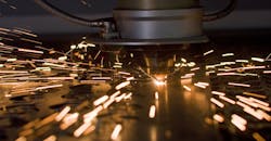 Laser cutting metal, up close. Laser cutting metal, up close.