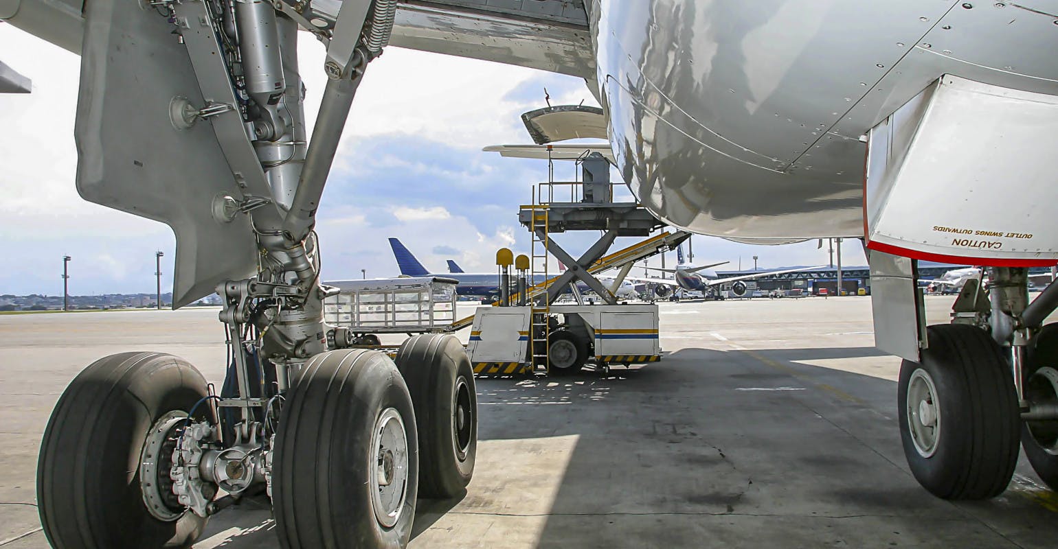 ID 214027465 &copy; Casadphoto | Dreamstime.com | Detail of landing gear of a commercial airplane.