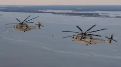 Two USMC CH-53K King Stallion heavy-lift transport helicopters.