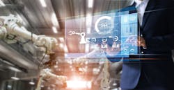 Manager / industrial engineer using a tablet checks and controls automation robot arms and machines in an intelligent factory. Manager / industrial engineer using a tablet checks and controls automation robot arms and machines in an intelligent factory.