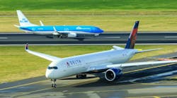 KLM Boeing 737 and Delta Air Lines Airbus A350 jets. KLM Boeing 737 and Delta Air Lines Airbus A350 jets.