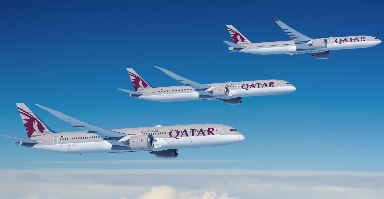 Boeing 787 Dreamliner and 777-9 widebody jets, illustrated in Qatar Airways livery.