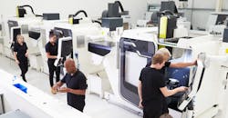 High-angle view of CNC machine shop. High-angle view of CNC machine shop.