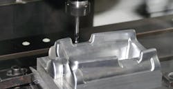 CNC cutting of a mold component. CNC cutting of a mold component.