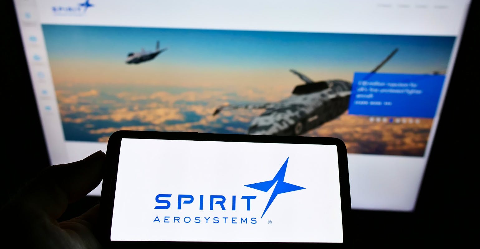 Mobile phone with logo of US aerostructures manufacturer Spirit AeroSystems.