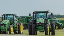 John Deere farm tractors and equipment. John Deere farm tractors and equipment.