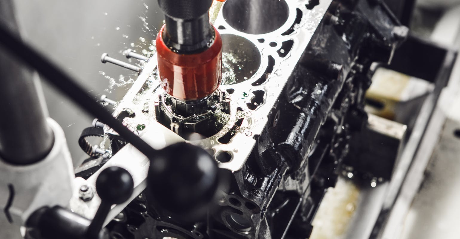 Automatic honing machine for engine block.