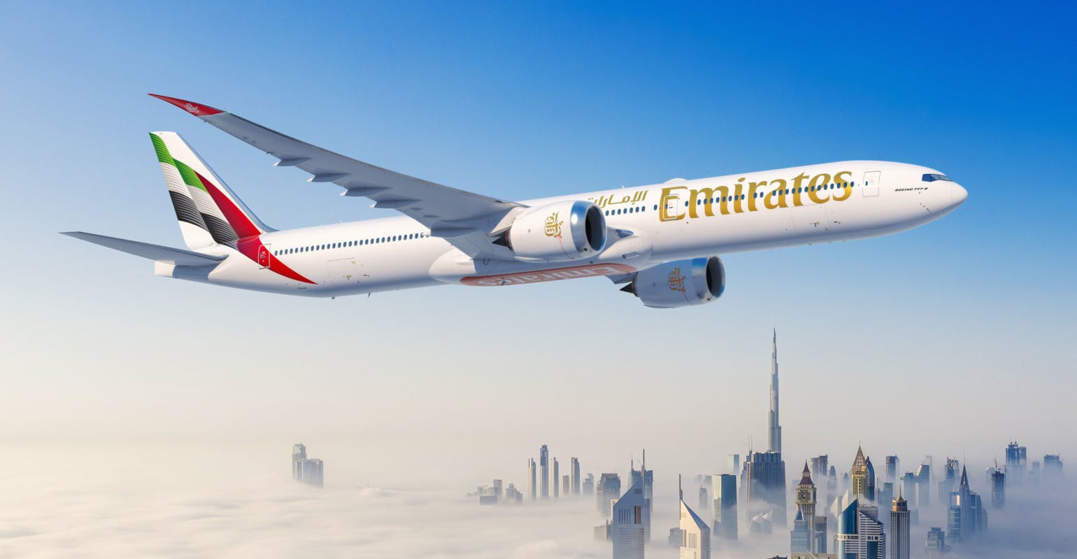 Boeing 777X illustrated in Emirates livery.