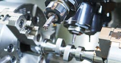 CNC turning of an automotive CAM shaft. CNC turning of an automotive CAM shaft.