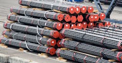 Steel bars, stacked and prepared for loading. Steel bars, stacked and prepared for loading.