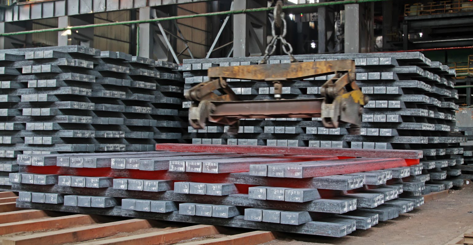Hot ingots in a steel plant, closeup.