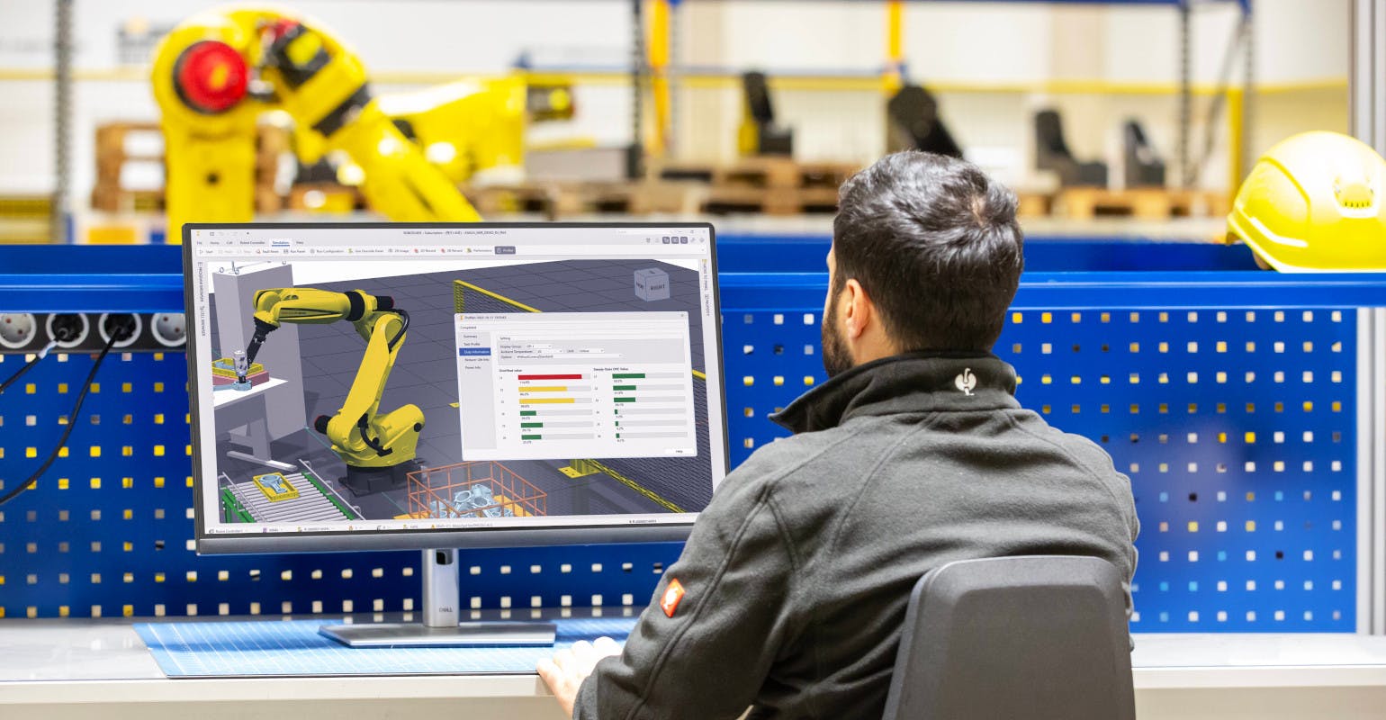 Programming FANUC robots.