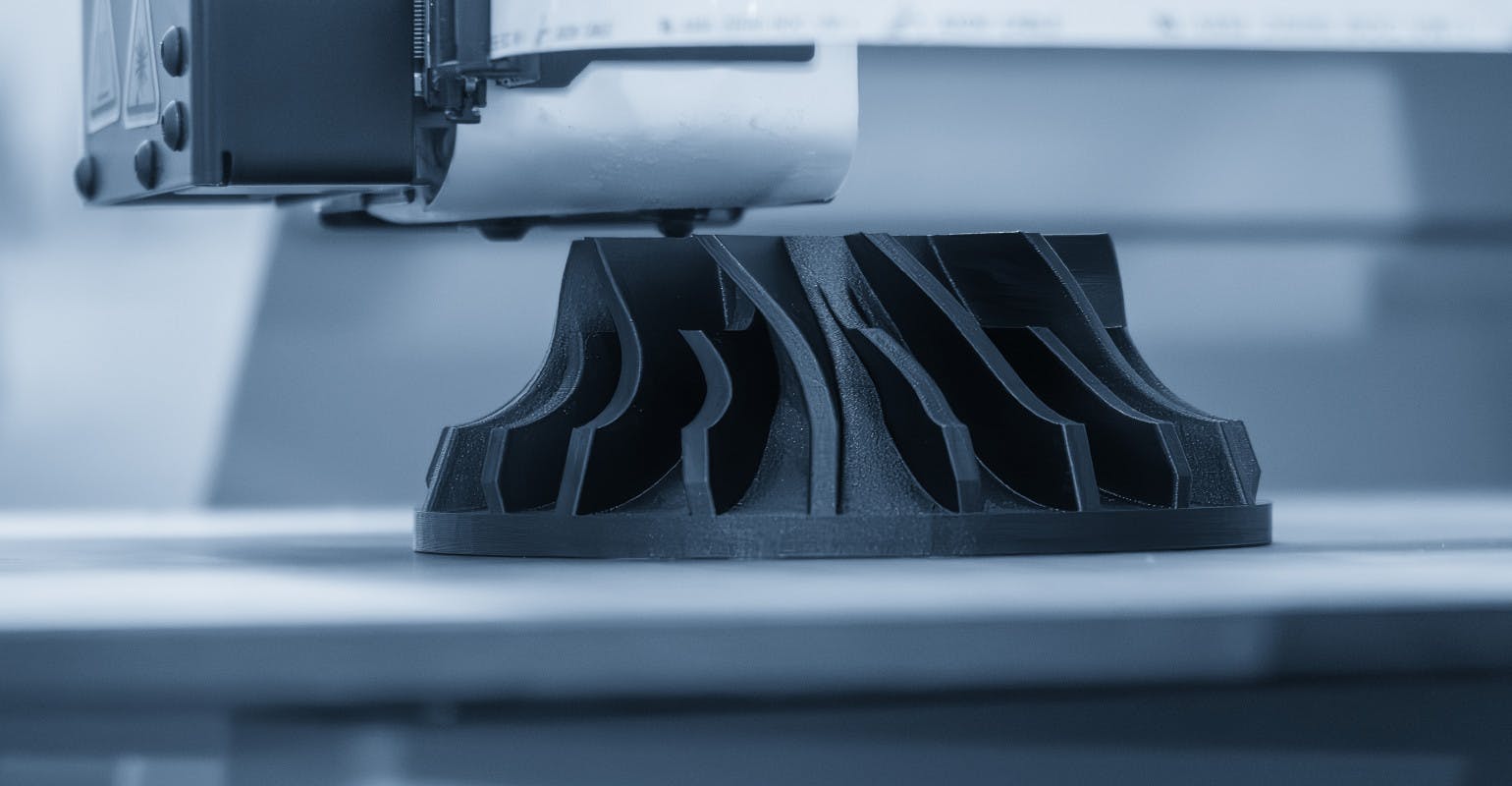 Closeup view of rapid prototyping via additive manufacturing.