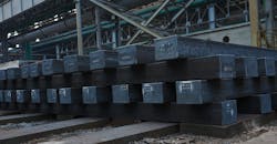 After high-temperature rolling, steel billets are stacked prior to storage or shipment. After high-temperature rolling, steel billets are stacked prior to storage or shipment.