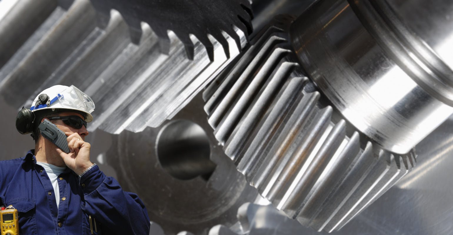 Engineer vs giant gear machinery,