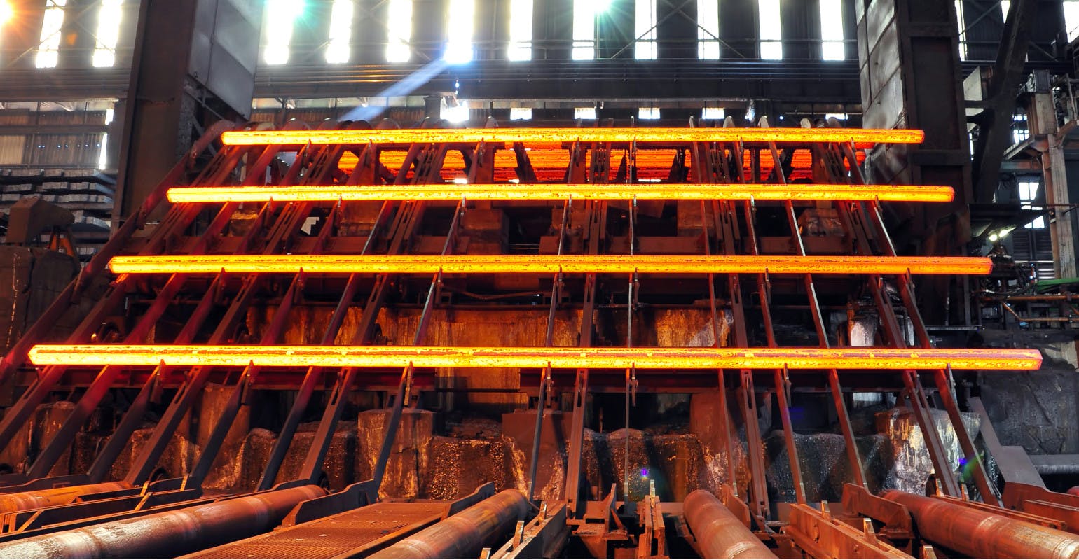 Steel bars on runout table.