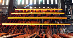 Steel bars on runout table. Steel bars on runout table.