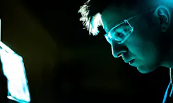 Engineer working at a bluescreen. Engineer working at a bluescreen.