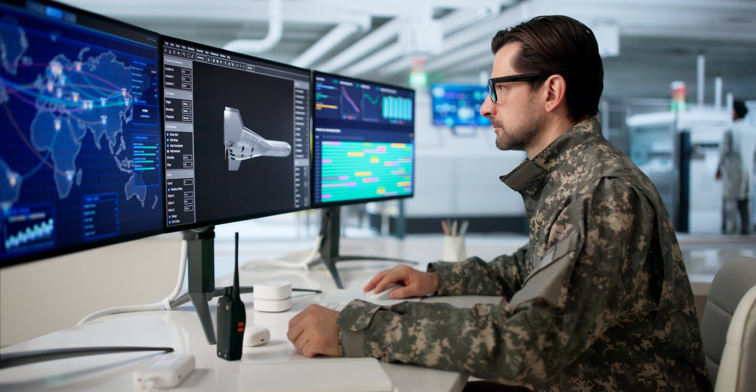 Engineer manages drone factory output.