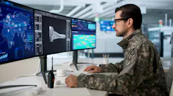 Engineer manages drone factory output.