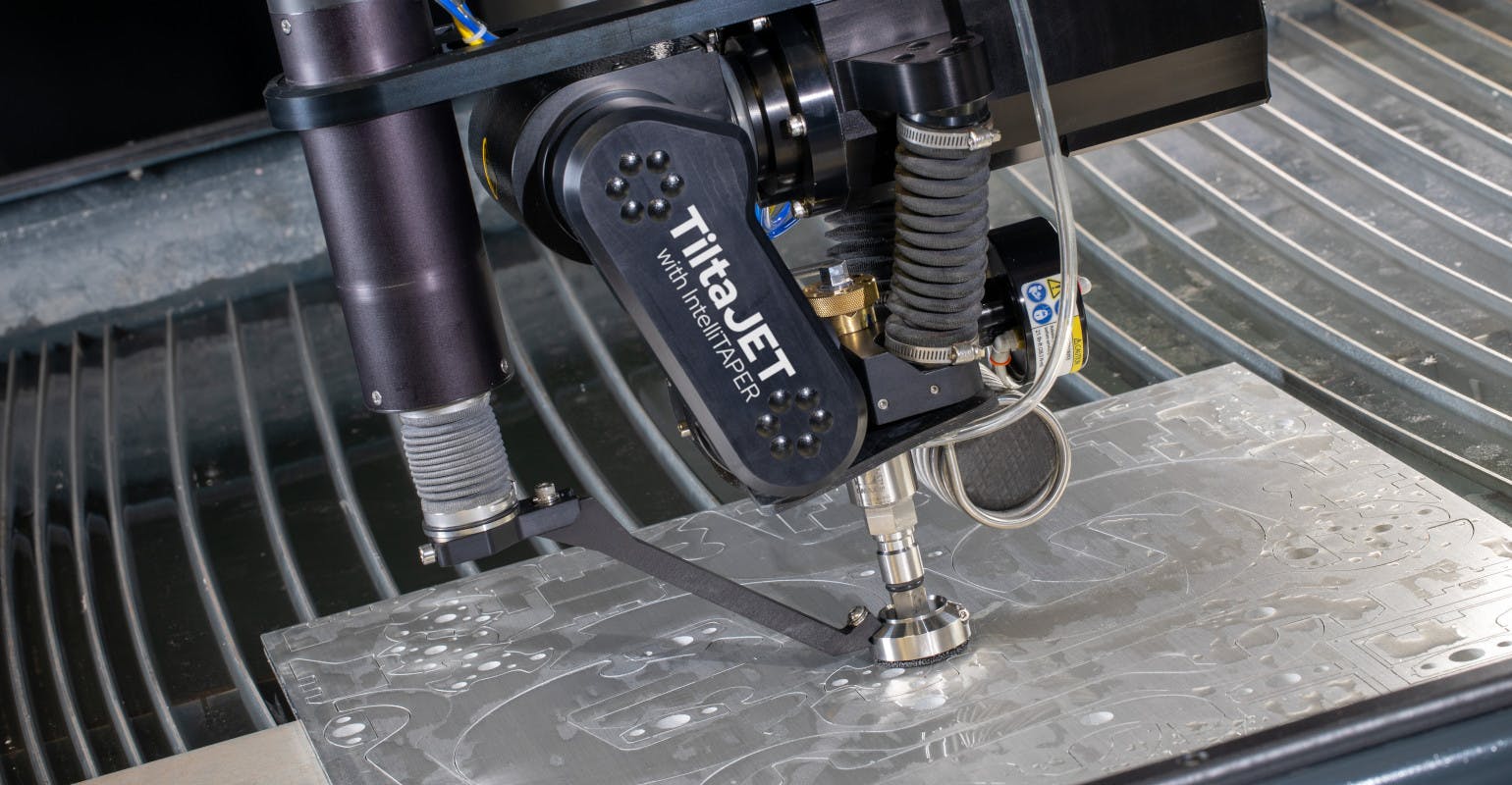 OMAX TiltaJET taper-eliminating abrasive jet cutting head