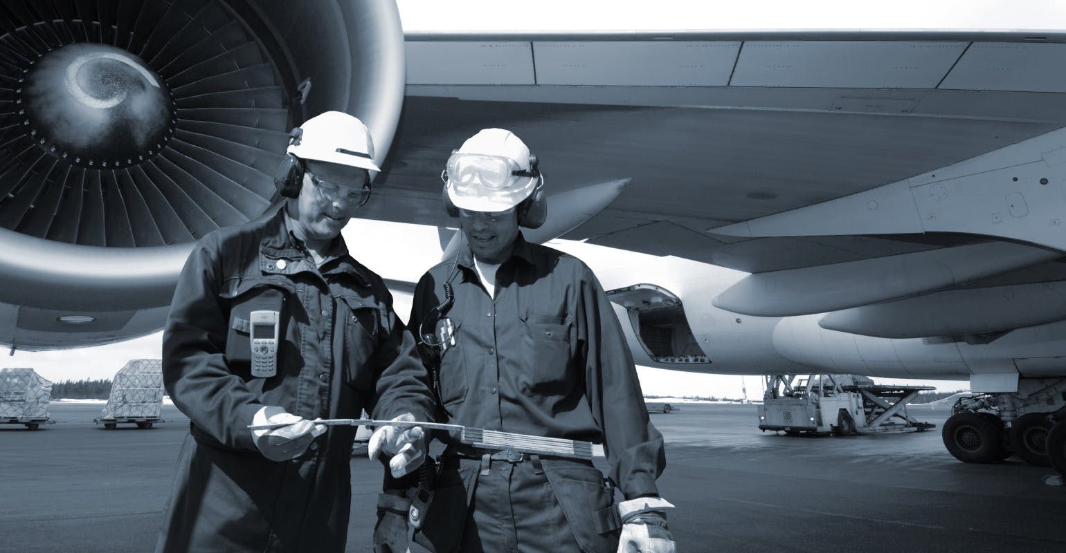 Engineers and airliner.