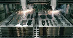 Nested blanks being cut by laser.