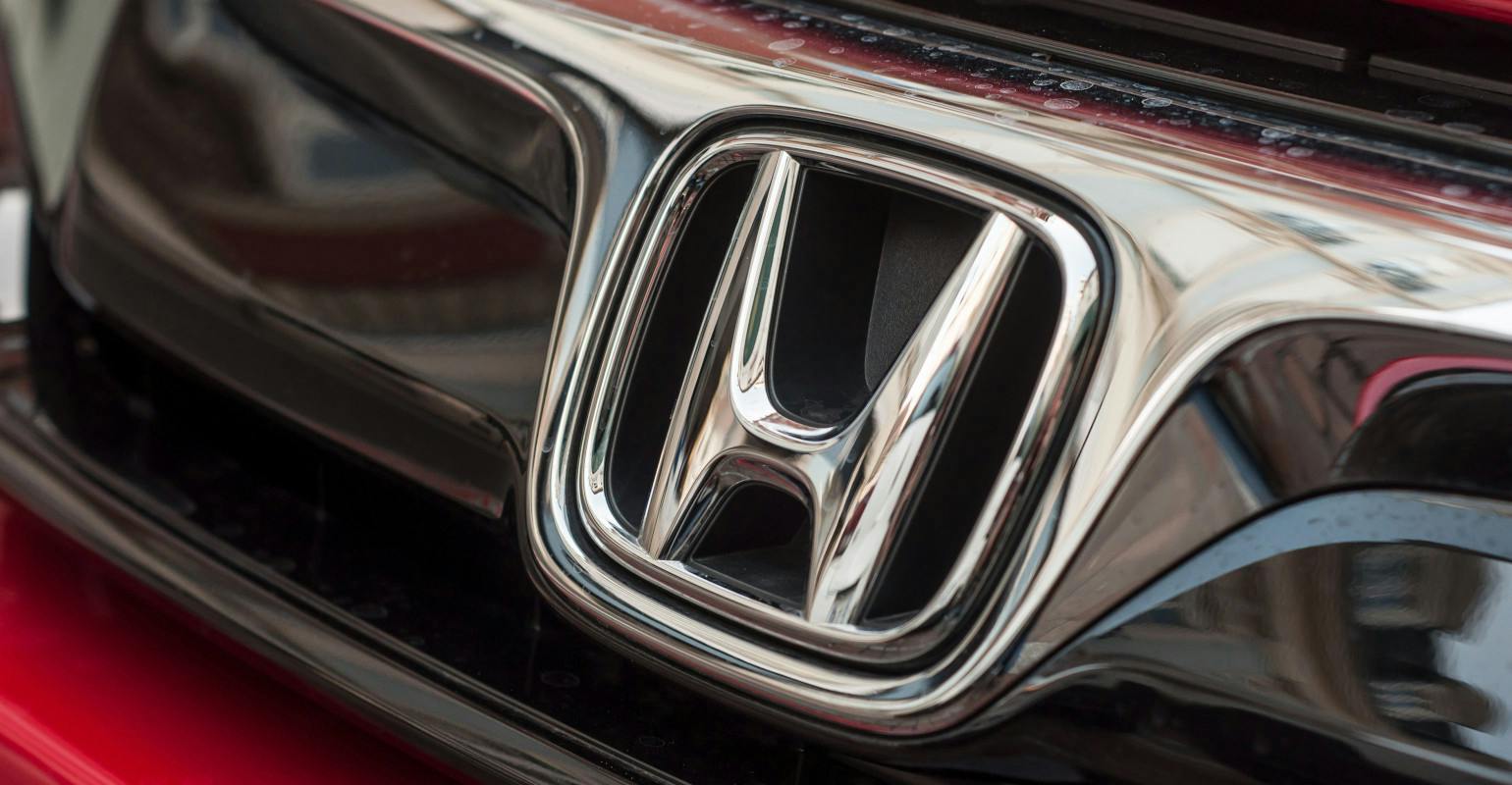 Close-up of Honda logo on Honda Civic grille