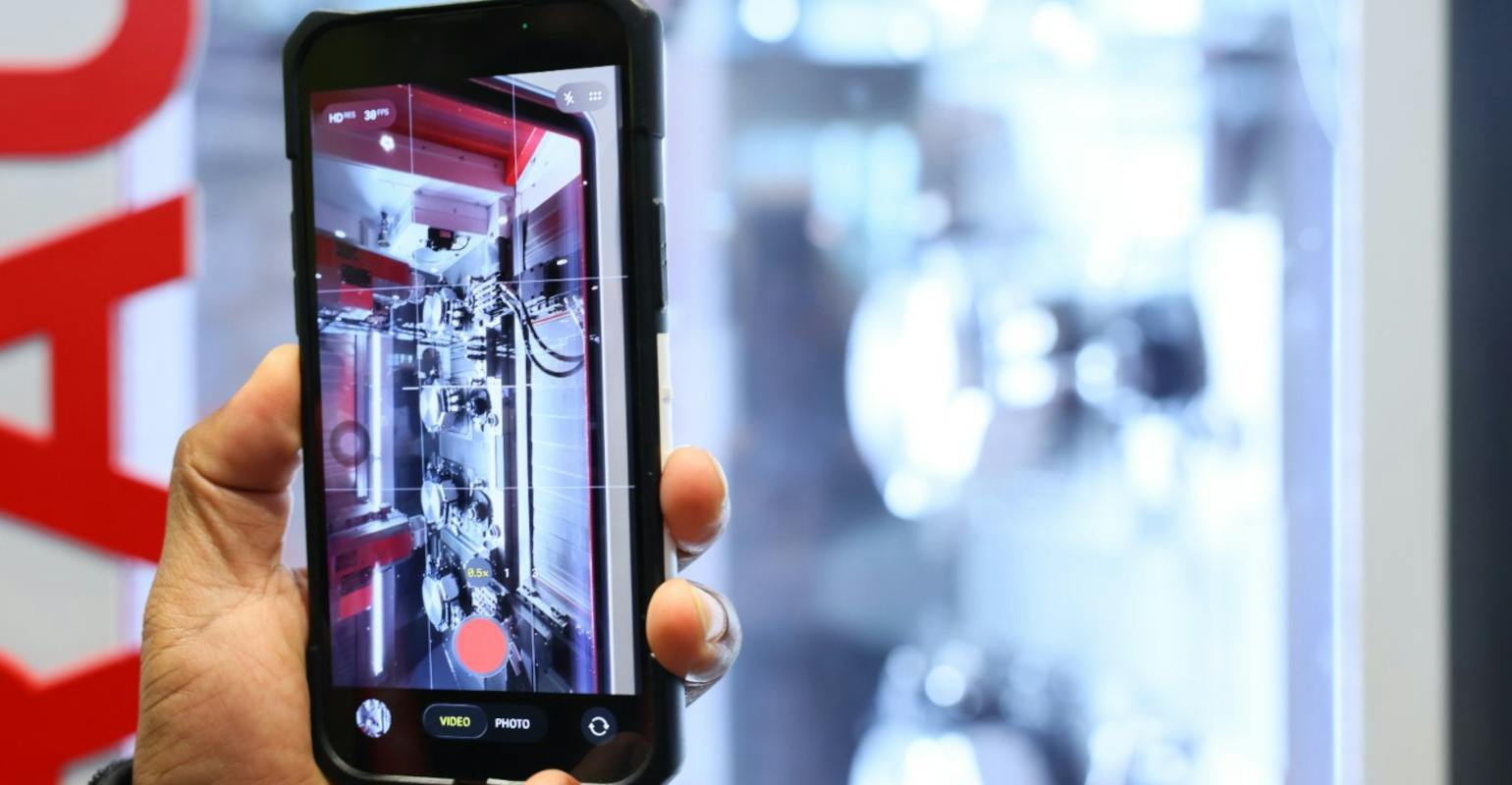 Smartphone, CNC machine close-up